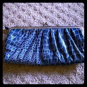 Blue crocodile clutch